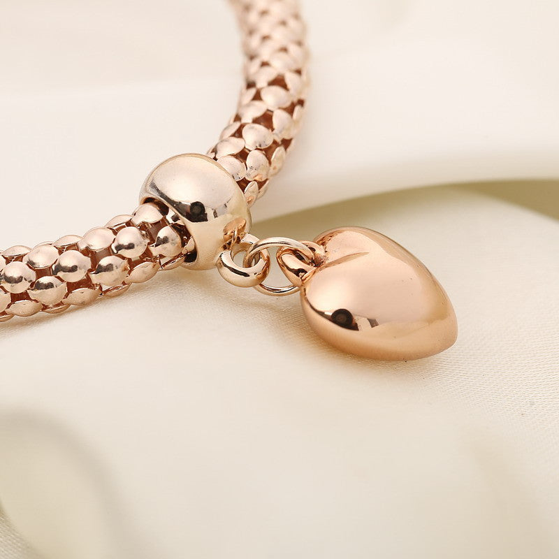 Aria – Metal bracelet featuring solid hearts