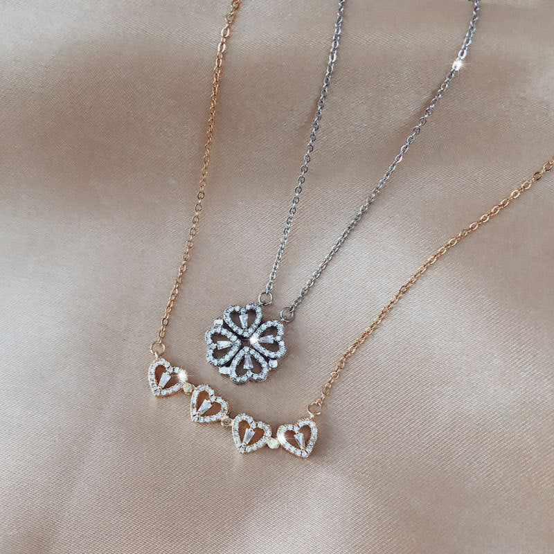 Necklace Featuring Four-Leaf Clover - Magnetic Heart Pendant