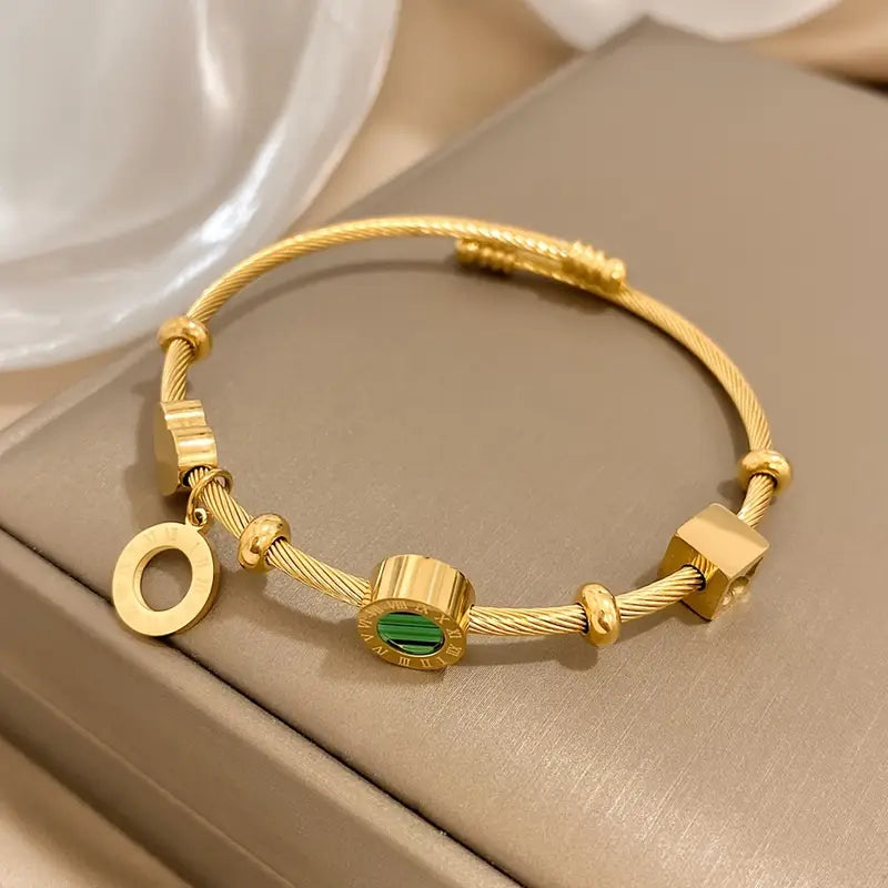 Rhian – Gold Bracelet with Signature