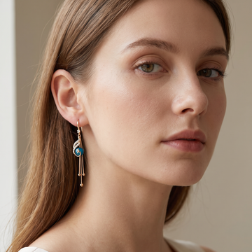 Sheynn – Festive Earrings featuring Blue Pearls