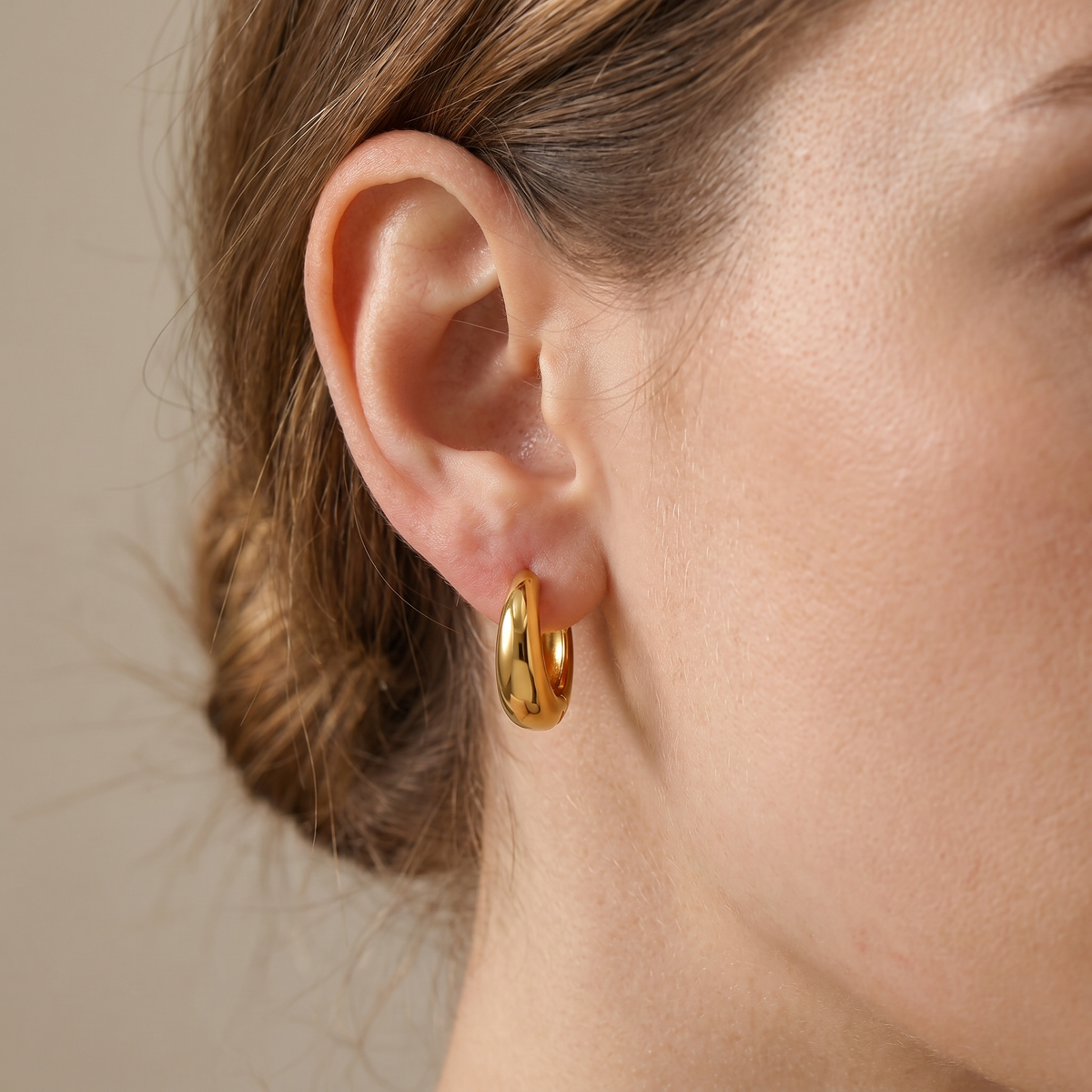 Iris – Geometric Huggie Hoops in Gold