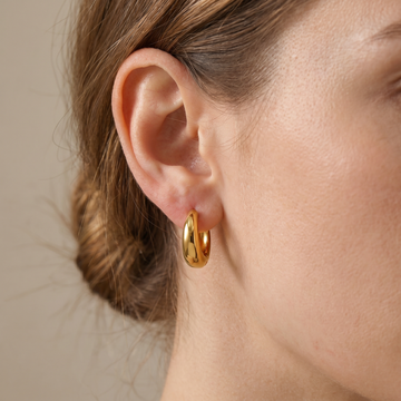 Iris – Geometric Huggie Hoops in Gold