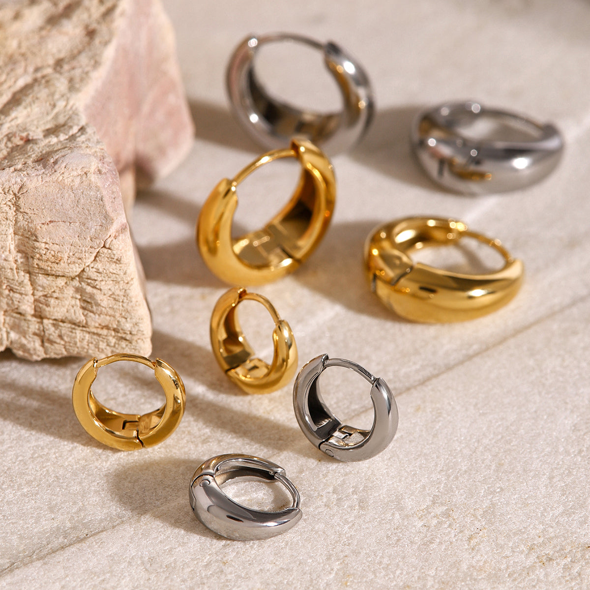 Iris – Geometric Huggie Hoops in Gold