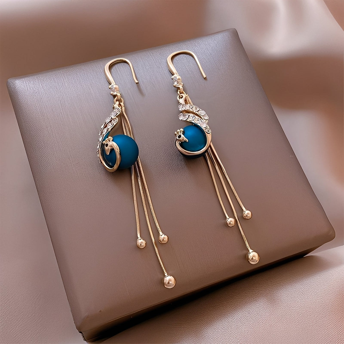 Sheynn – Festive Earrings featuring Blue Pearls