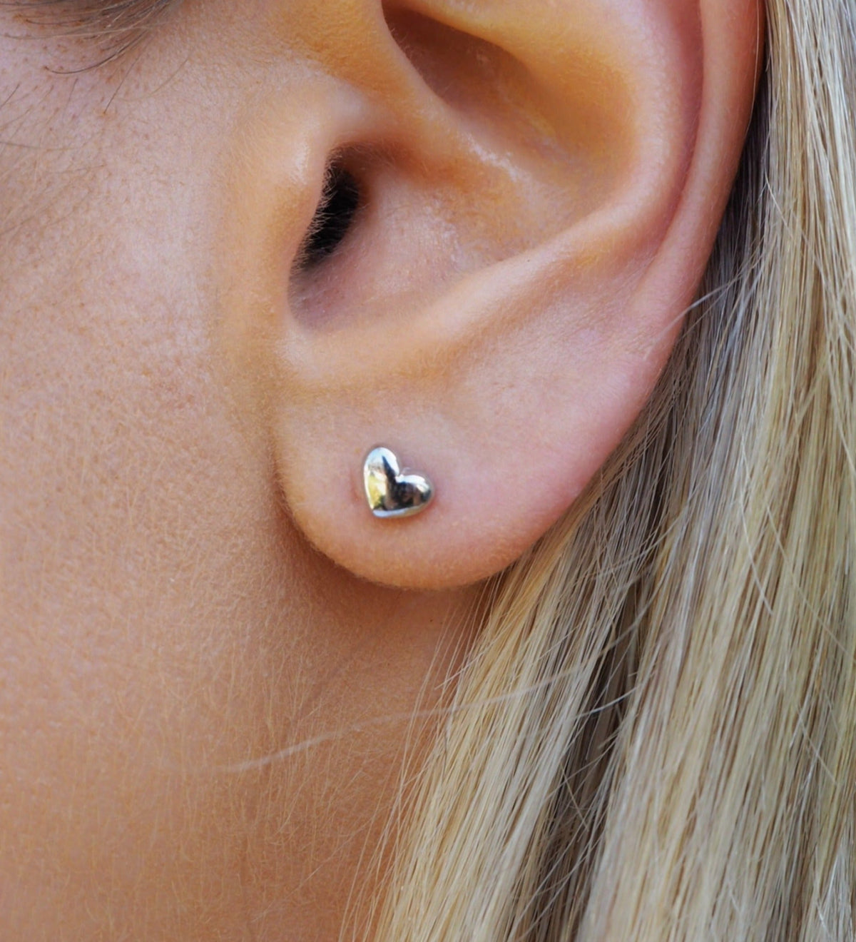 Mini Heart Stud Earrings crafted from Silver
