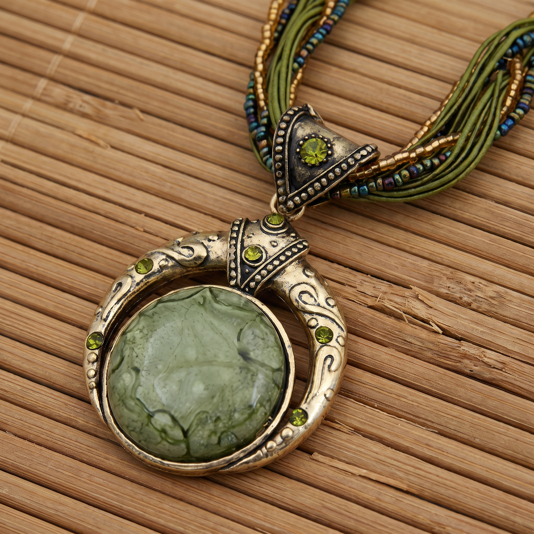Raya – Gold Necklace with Green Charm