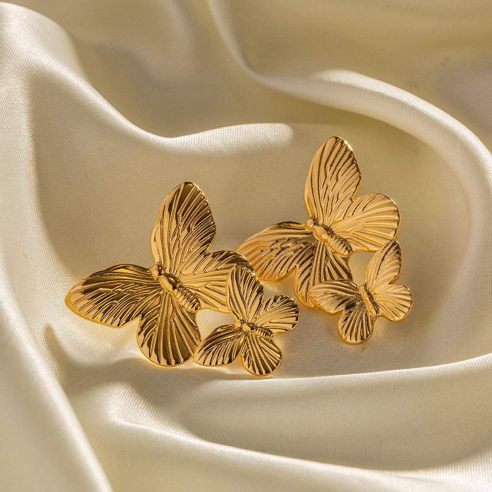 Mariah - Gold Earrings Featuring Butterfly Design