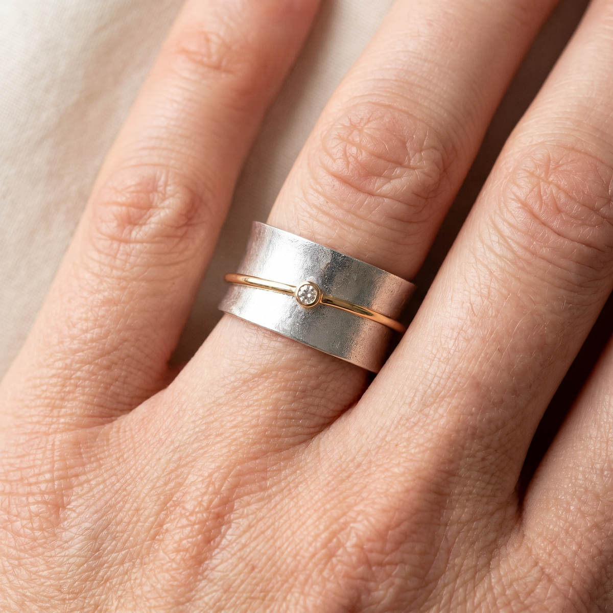Lilia – Silver Ring Featuring Golden Line and Zirconia