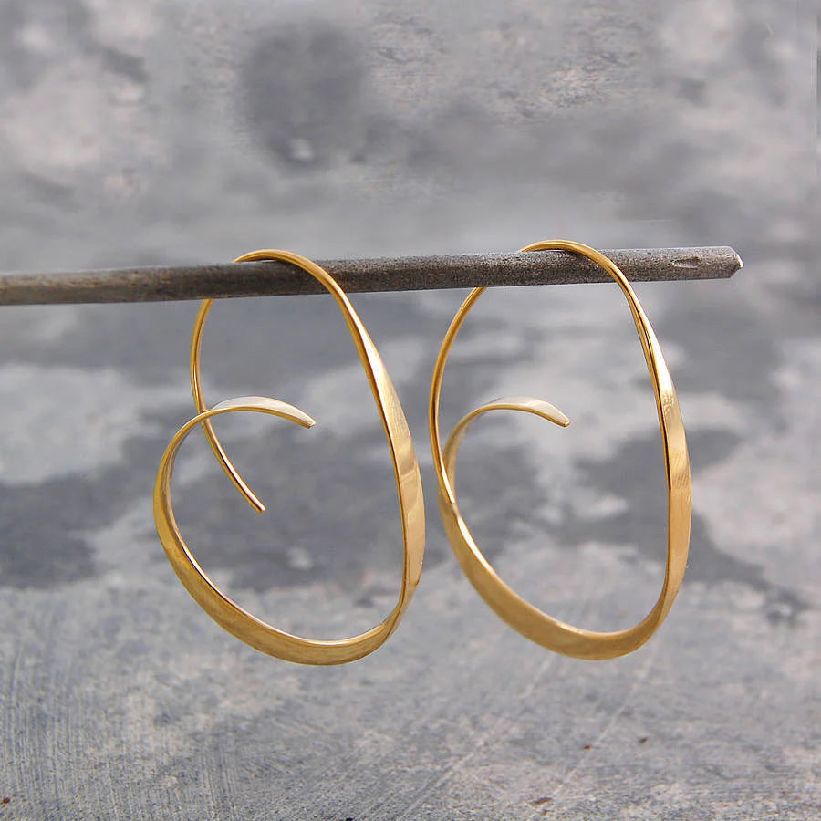 Becca – Earrings featuring a trendy spiral design