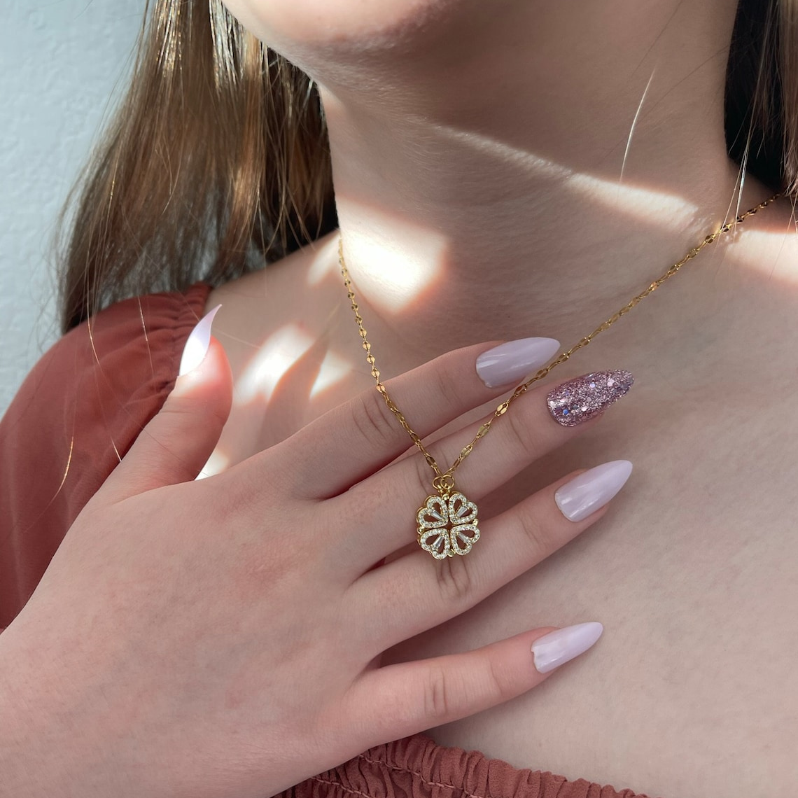 Necklace Featuring Four-Leaf Clover - Magnetic Heart Pendant