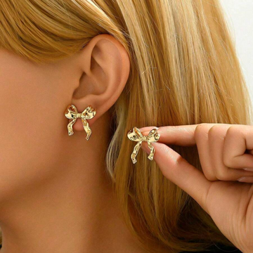 White Gold Stud Earrings Featuring Bow Design