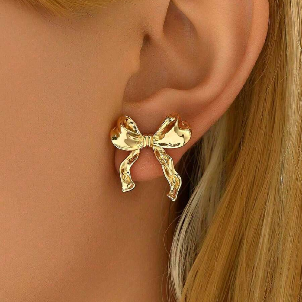 White Gold Stud Earrings Featuring Bow Design