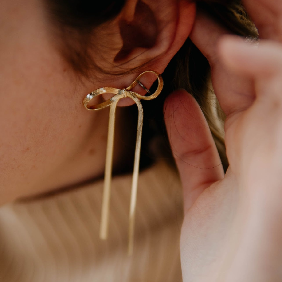 Extended Bow Tassel Earrings - Band Earrings