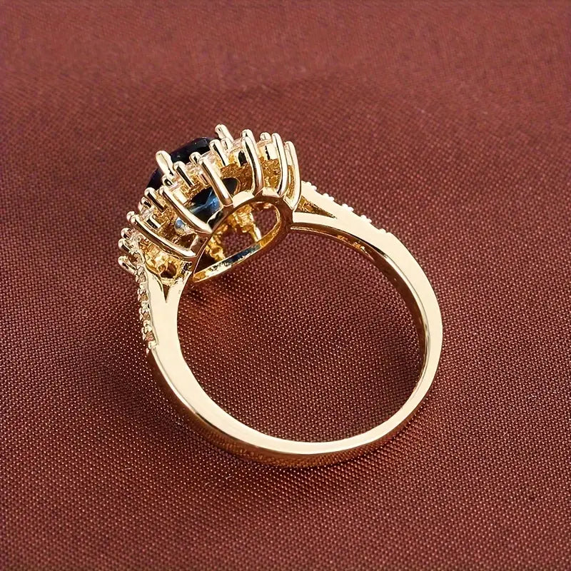 Delphine – Elegant Gold Ring with Blue Gemstone