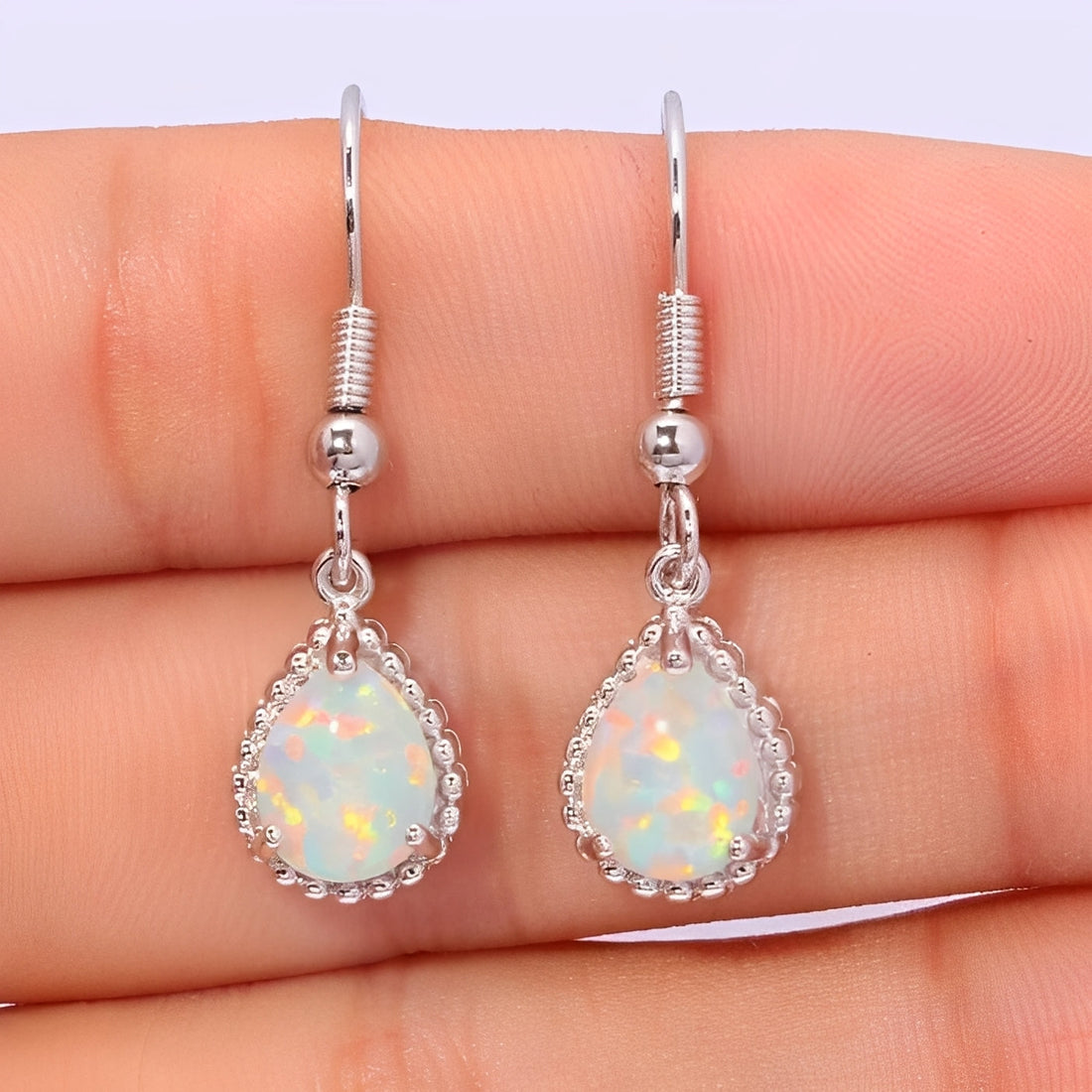 Emeline – Hanging Earrings crafted from Silver & White Fire Opal