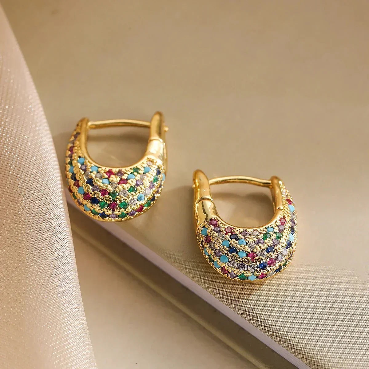 Hara – Wide Shiny Hoops Featuring Diamonds