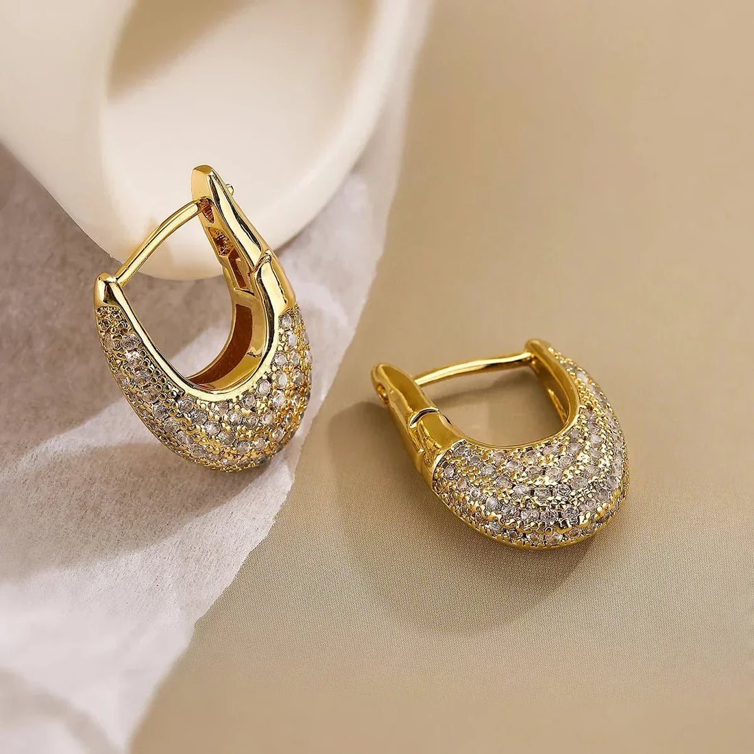 Hara – Wide Shiny Hoops Featuring Diamonds