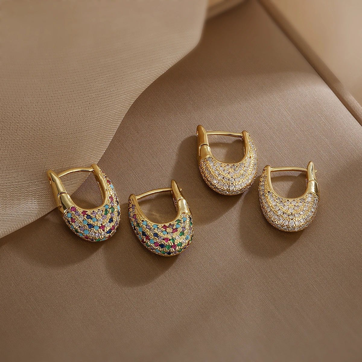 Hara – Wide Shiny Hoops Featuring Diamonds