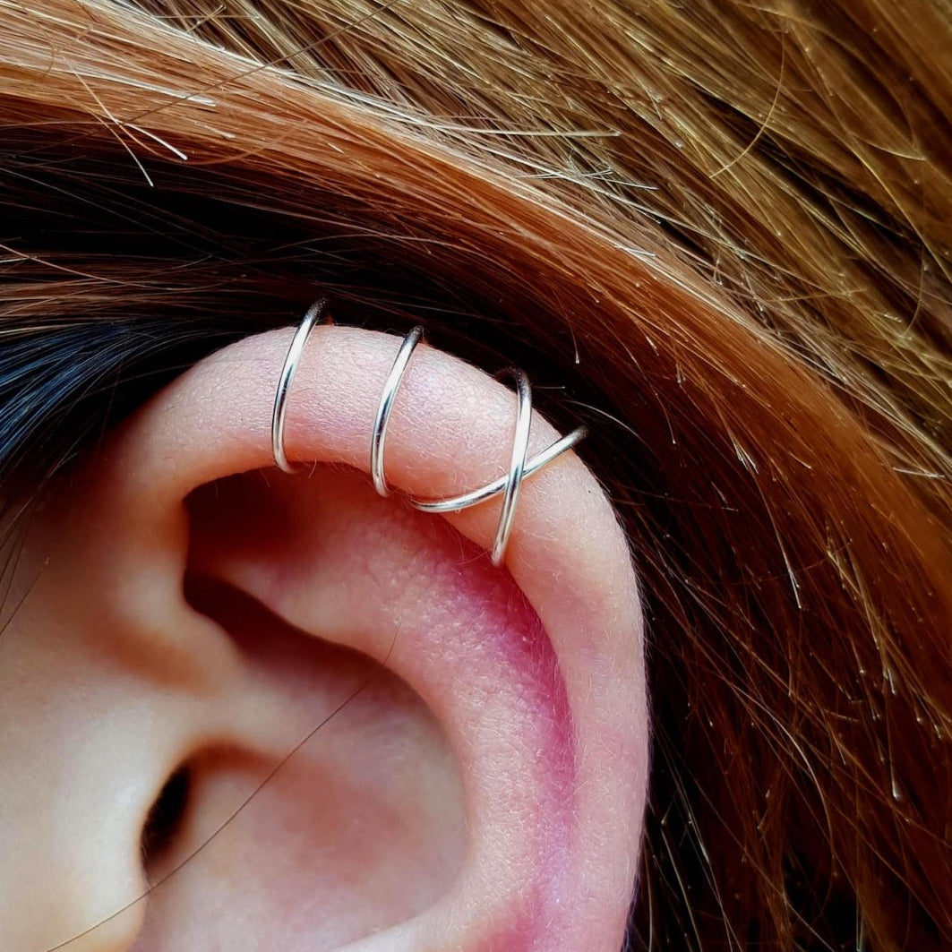 Hanan - Crossed Ear Protectors