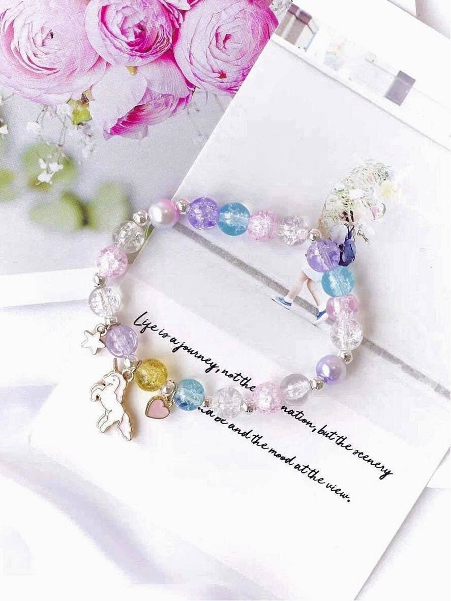 Dreamy - Pearl Bracelet featuring Unicorn Charm