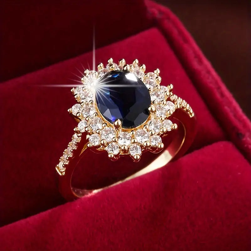 Delphine – Elegant Gold Ring with Blue Gemstone