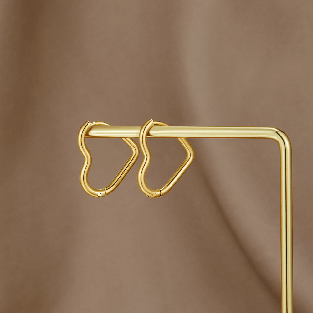 Tessia – Golden Heart-Shaped Hoops