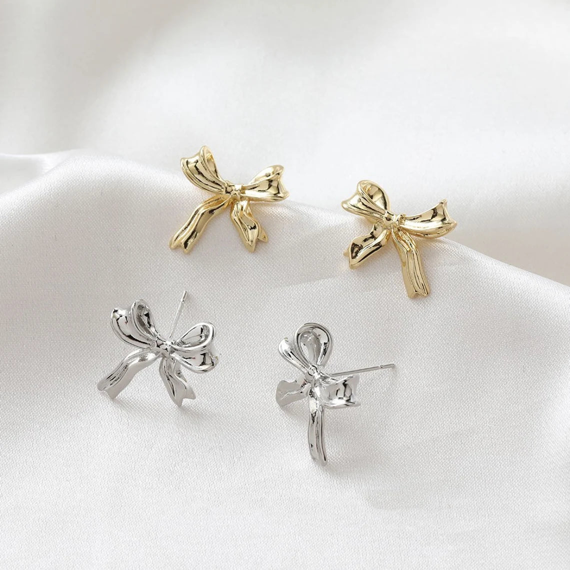 White Gold Stud Earrings Featuring Bow Design