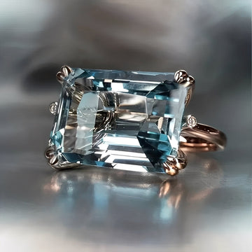 Nadine – Classic Gold Ring featuring Blue Zircon
