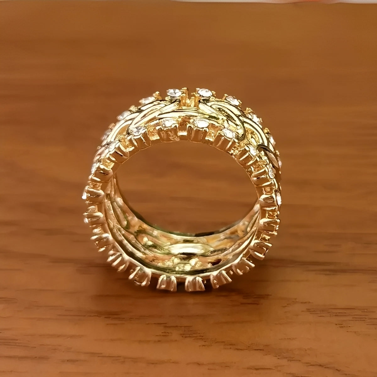 Lydia – Jewelry item crafted from braided gold featuring zirconia