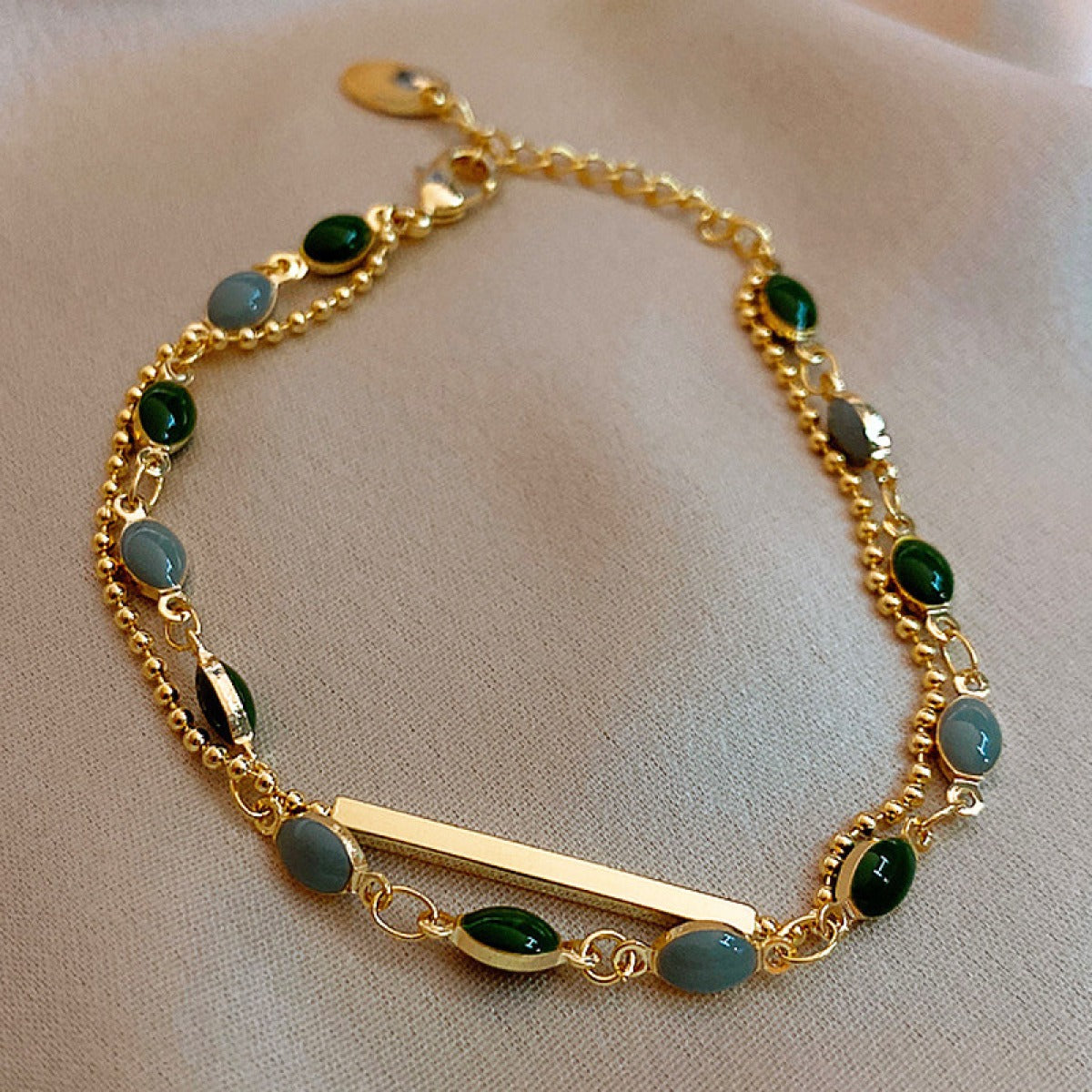 Manon – Bracelet featuring Green Stone in Gold