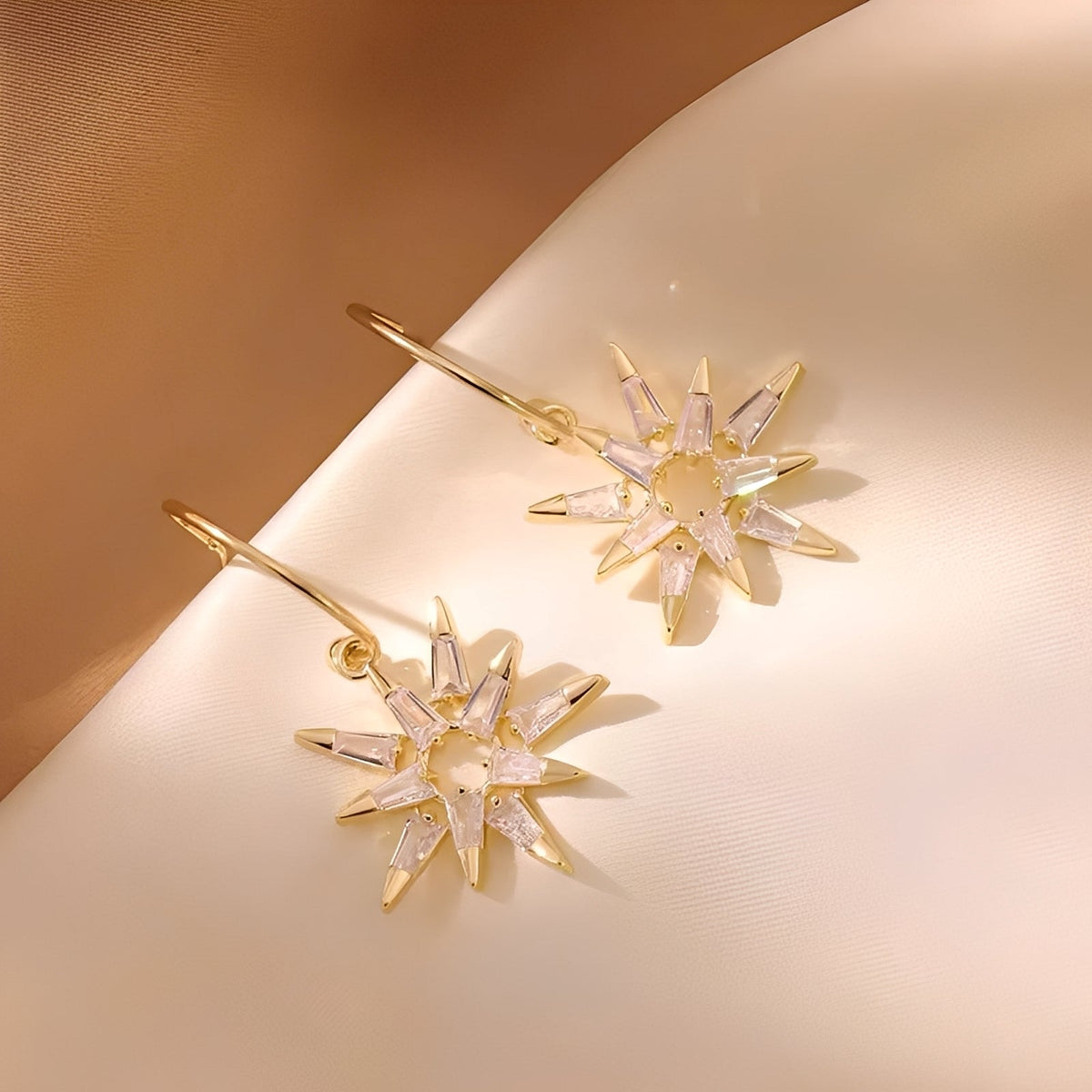 Xienna – Shimmering golden star earrings