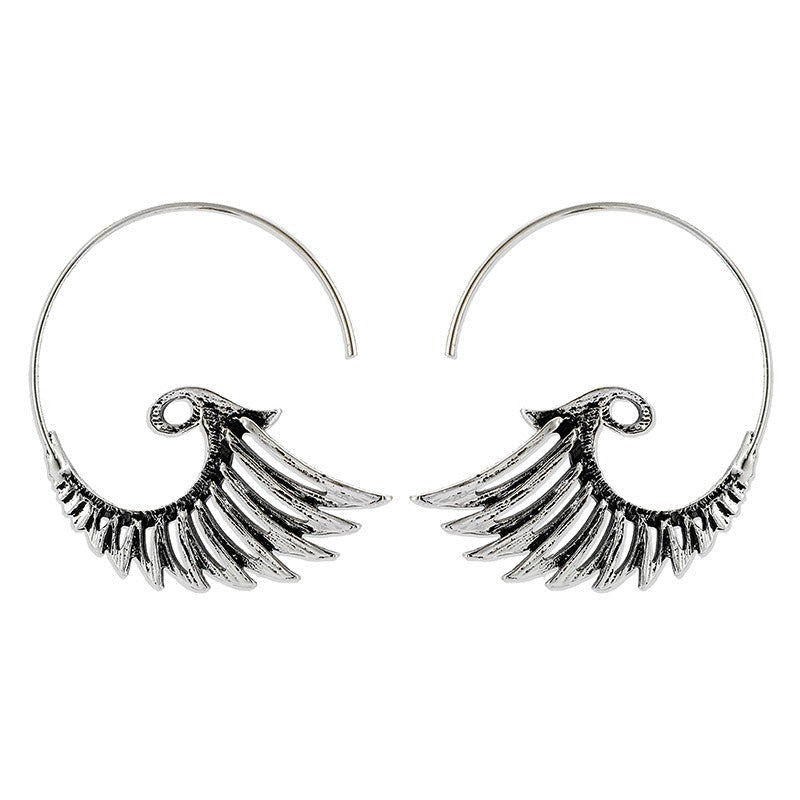 Zia – Golden Earrings Featuring Wing Design