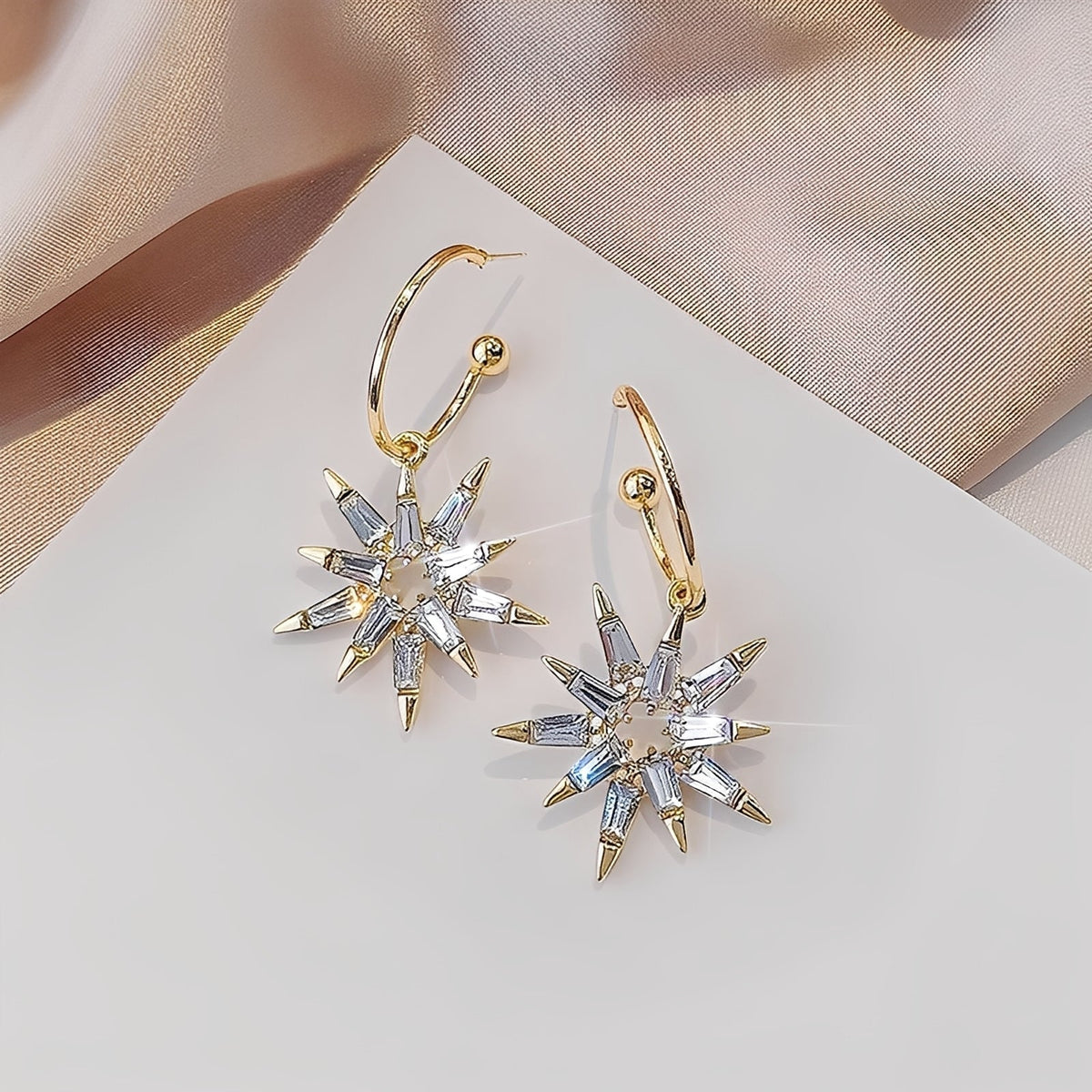 Xienna – Shimmering golden star earrings