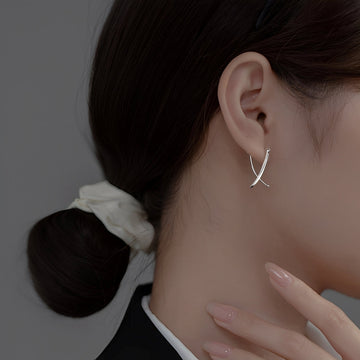 Vanny – Cross earrings in trendy gold