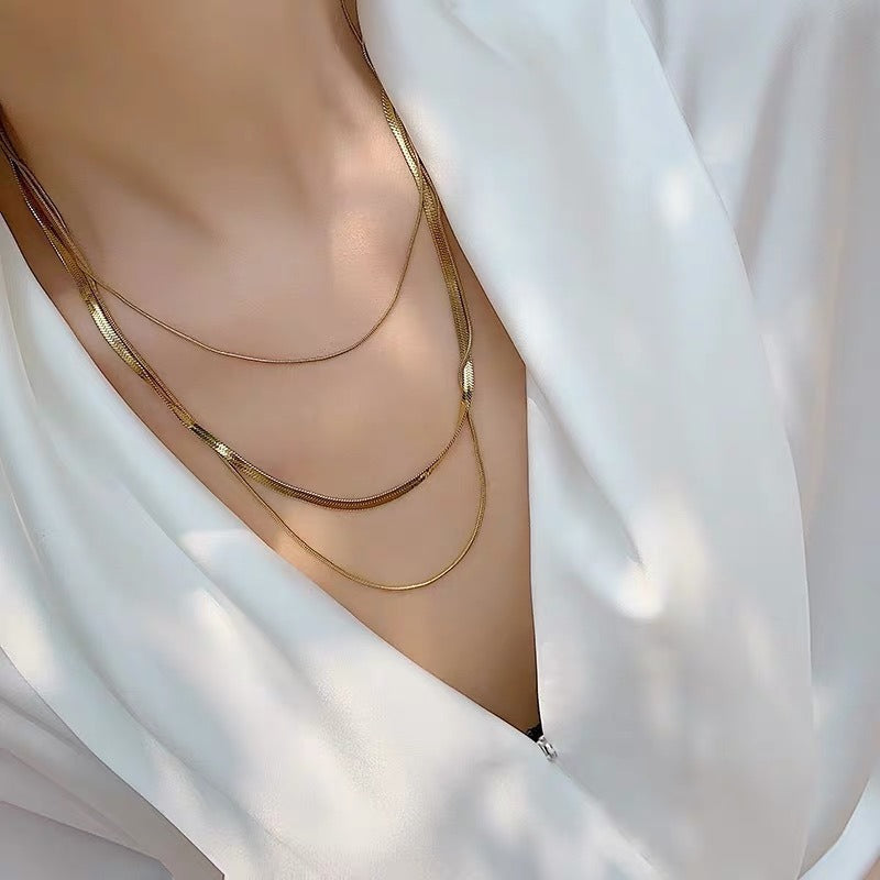 Ashley – Golden 3-Row Snake Chain Necklace