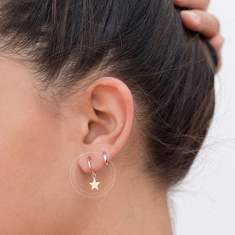 Stellia – Five-Pointed Star Earrings in Gold