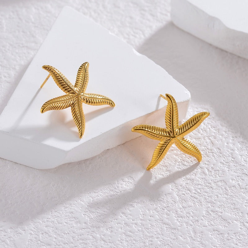 Pien – Golden starfish earrings