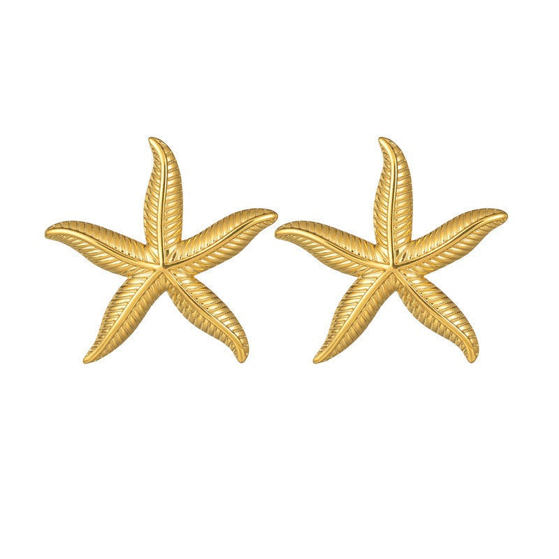 Pien – Golden starfish earrings