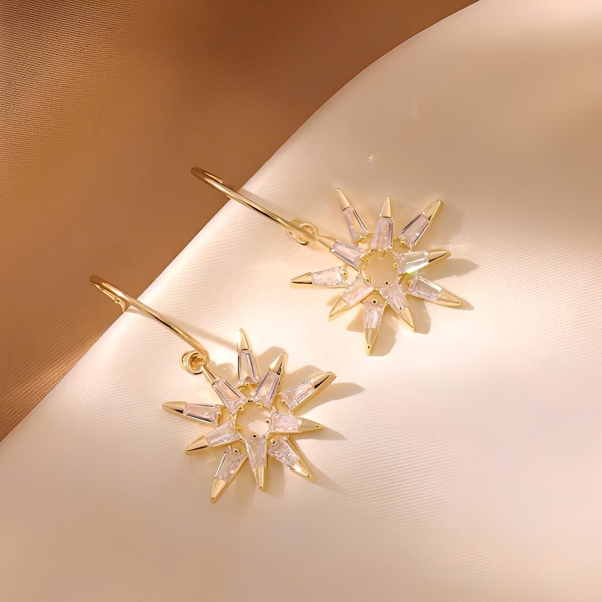 Xienna – Shimmering golden star earrings