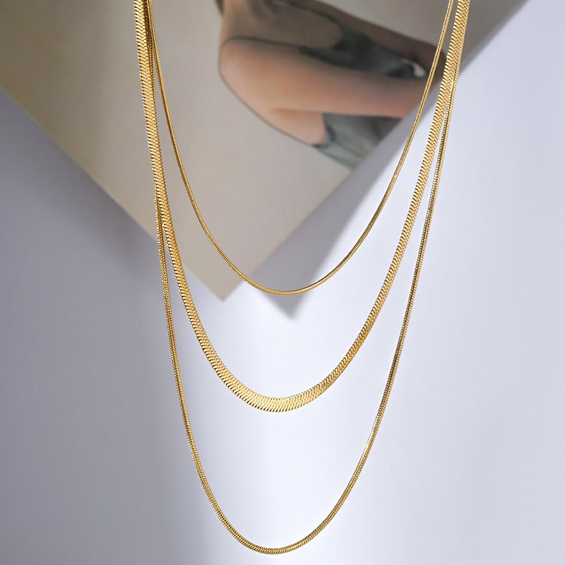Ashley – Golden 3-Row Snake Chain Necklace