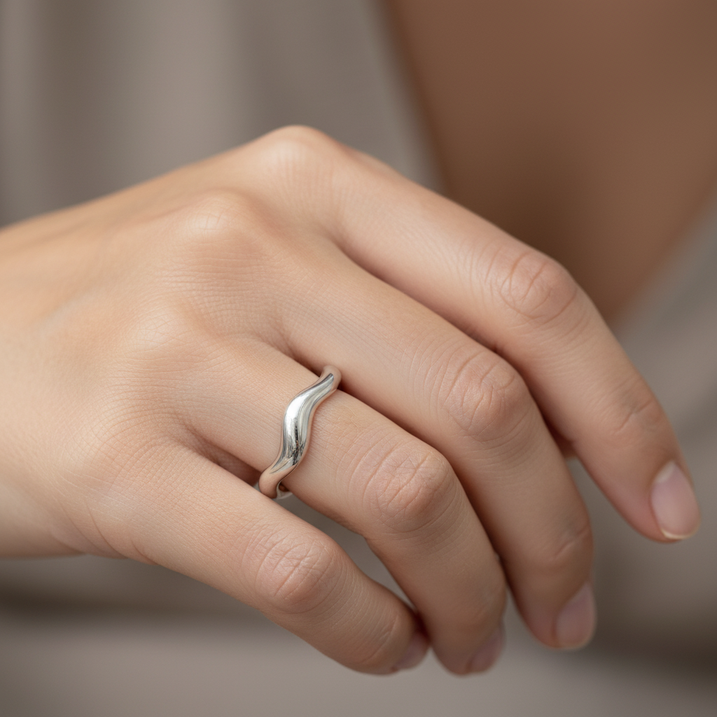 Theva – Open Water Wave Ring in Titanium Steel