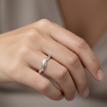 Theva – Open Water Wave Ring in Titanium Steel