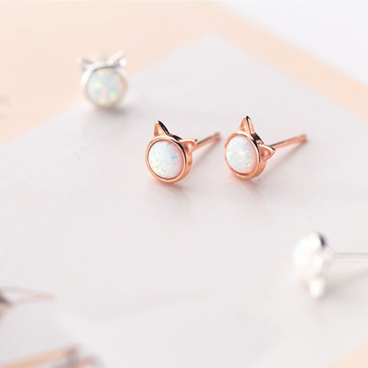 Sepideh - Cat earrings featuring opal stone