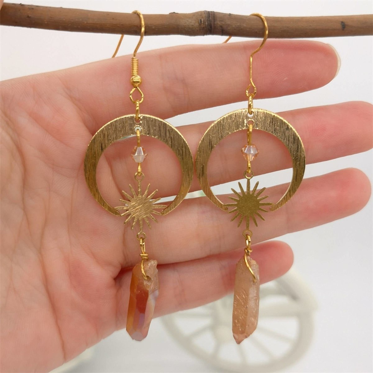 Homa - Crescent Moon Earrings crafted from Tangerine Quartz